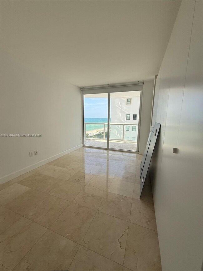 Building Photo - 6365 Collins Ave