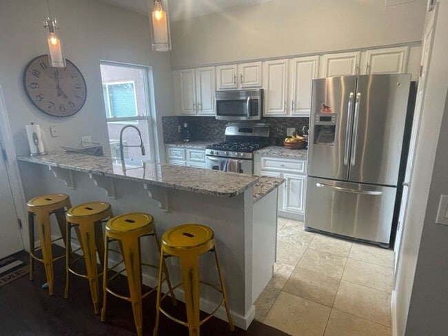 Building Photo - LOCATION!  Newer contemporary townhome 2 bed w/office space in Denver's desirable Berkeley neighb...