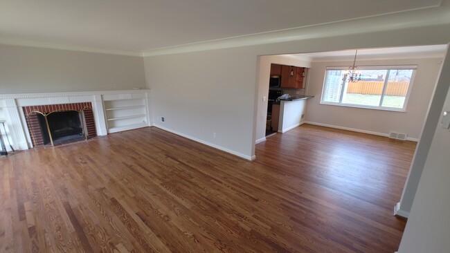 Living room opens into formal dining room - 6934 Winding Way