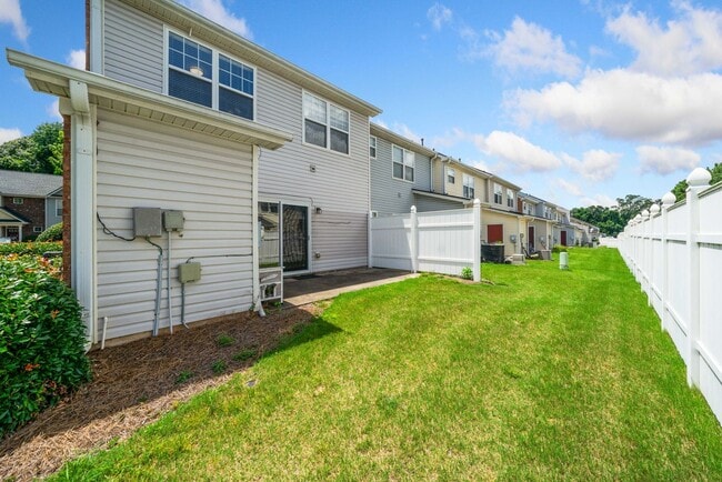 Building Photo - 3-bedroom, 2.5-bath end-unit townhome in the Garrison Square