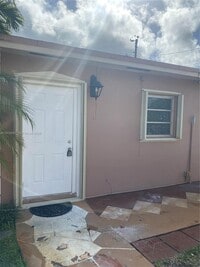 Building Photo - 10701 NW 23rd Ave