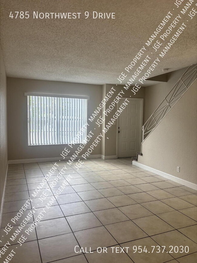 Building Photo - 4785 NW 9th Dr