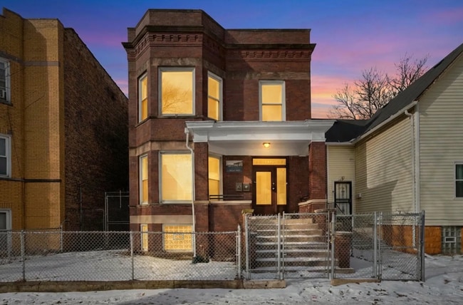 Building Photo - 7442 S Langley Ave