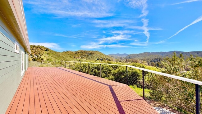 Building Photo - Stunning Single-Story with Spacious Deck, Panoramic Views, on Gated/Fenced Property!