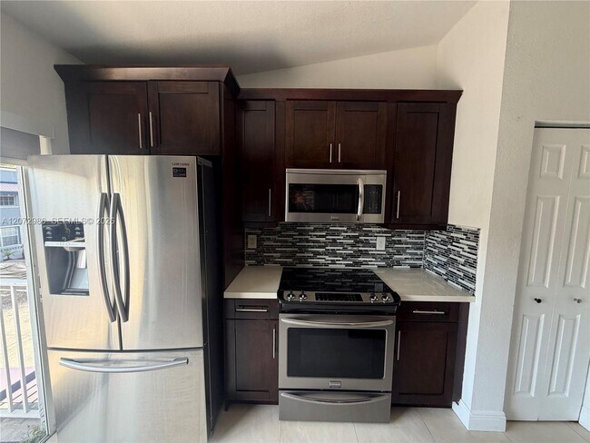 Building Photo - 7040 NW 173rd Dr