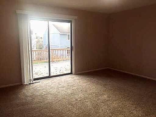 Building Photo - Spacious East Anchorage Home with Yard & Garage!