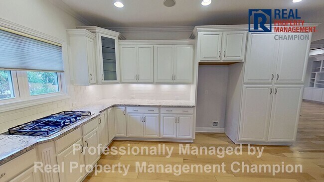 Building Photo - Custom 4BD/3BA Home with Hardwood Floors, Office, and Sunroom