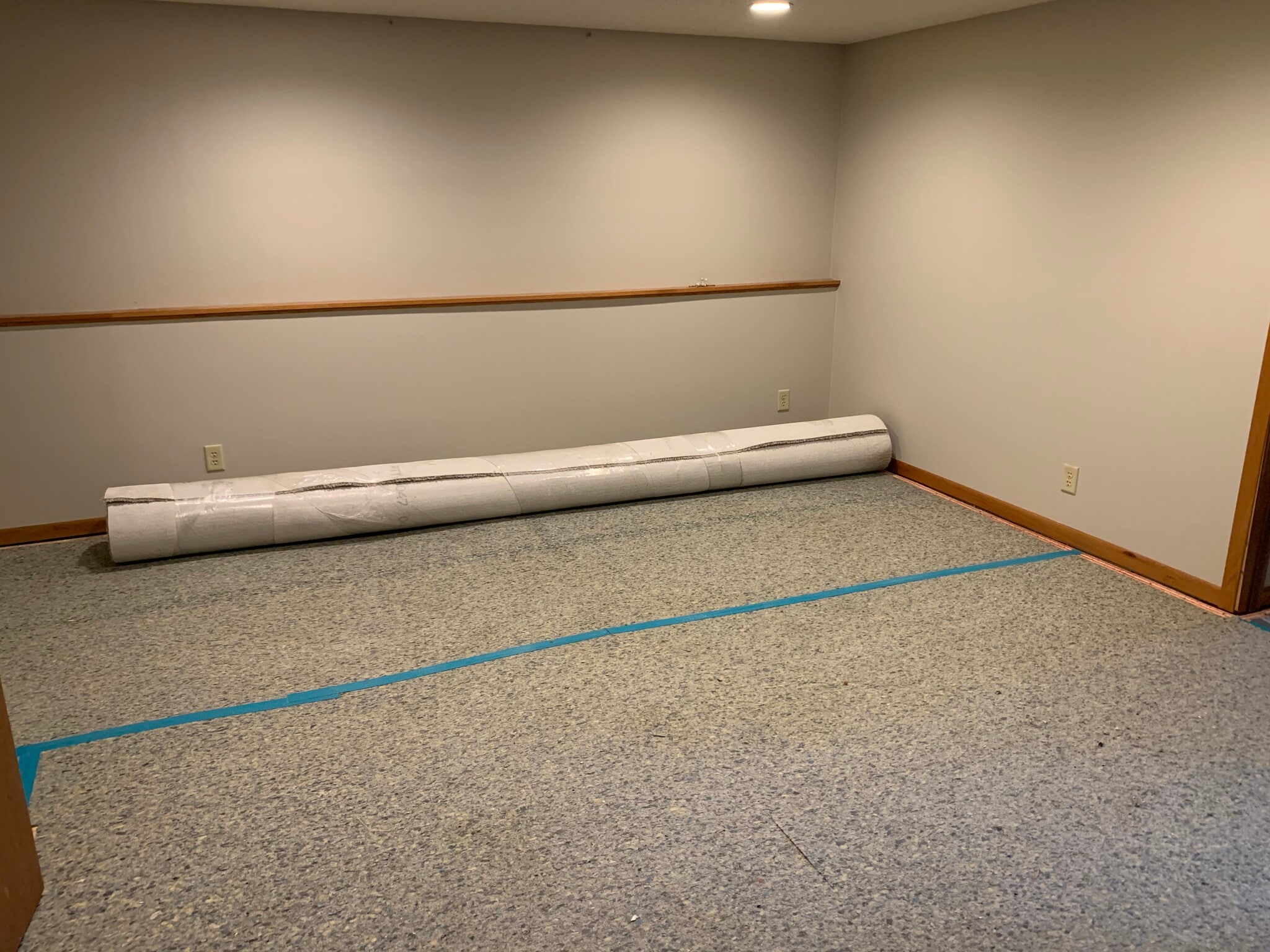 Basement carpet install. - 2044 Bradley St