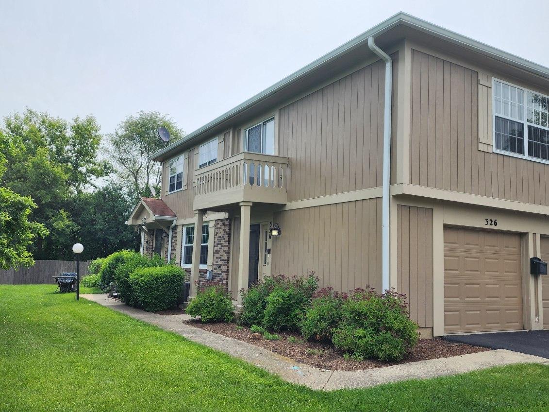 Main entrance side of the building - 326 Plumwood Ln