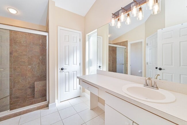 Building Photo - AVAILABLE May 1 - Single Family Pool Home in the Heart of Three Oaks