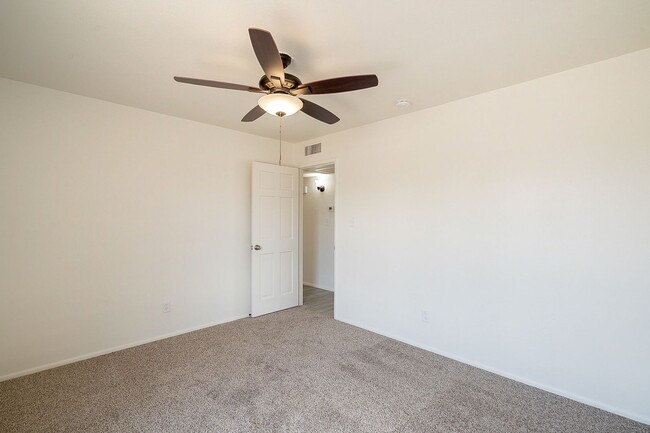 Building Photo - Updated home with large backyard & 2 car g...