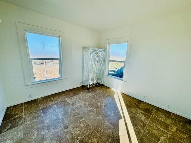 Building Photo - Country-style home with 3 bedrooms, Upstairs Den/Office, 2 baths offering a charming and peaceful...