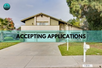 Building Photo - Spacious 4-Bedroom, 3-Bath Beauty – Move-I...