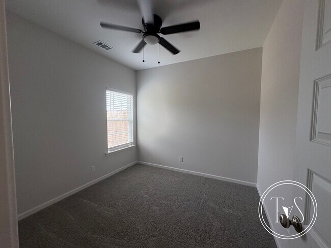 Building Photo - The perfect blend of modern living and small-town charm