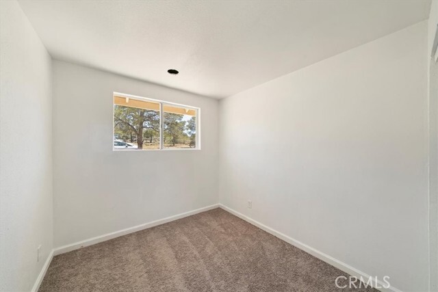 Building Photo - 63285 Pinyon Dr