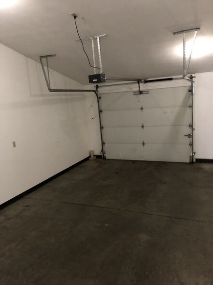 Finished insulated 1.5 car garage with opener - 1010 Lakeshore Dr
