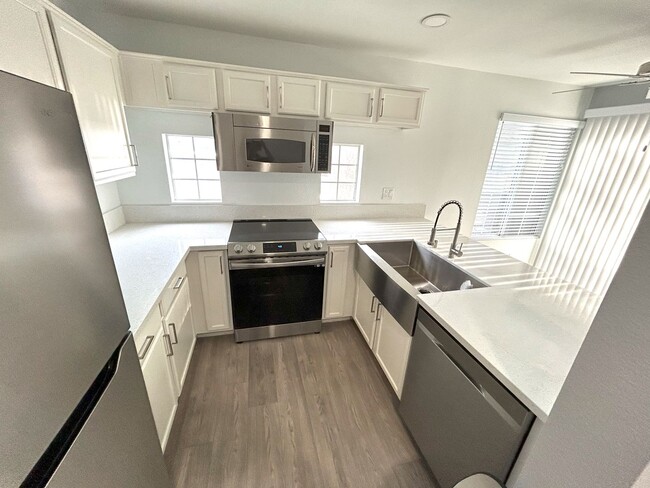 Building Photo - Charming 2-bedroom, 2-bath condominium ready to be called home!