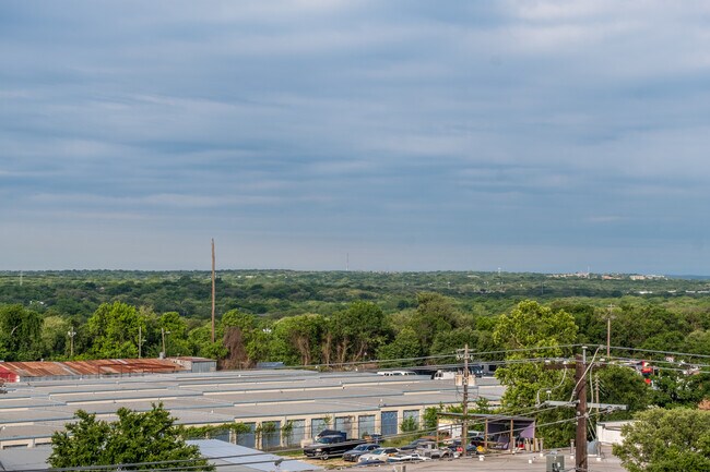 Building Photo - South Austin 2BR Condo with Balcony & Luxury Amenities