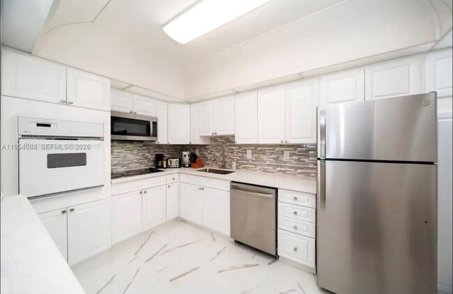 Building Photo - 19370 Collins Ave