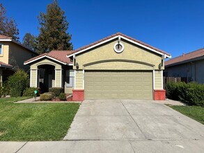 Building Photo - 3 Bed| 2 Bath | 1243 SF | 2 Car Garage | Single Story | Tenant pays $175 monthly for WS&G