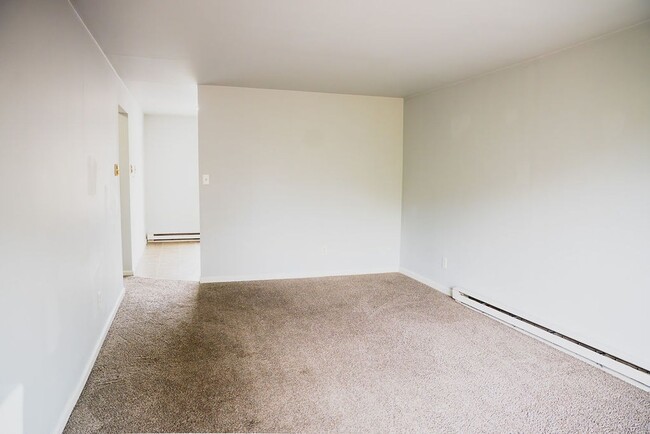 Building Photo - $100 OFF SPECIAL - Austin Street Homes - Comfort & Convenience Combined – 2BR Townhomes Now Leasing