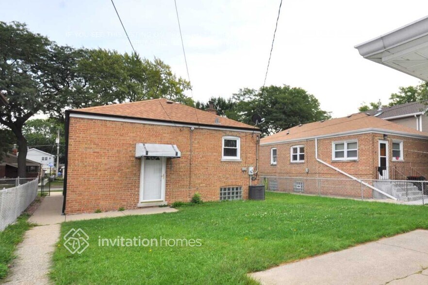 Building Photo - 5850 S Natchez Ave