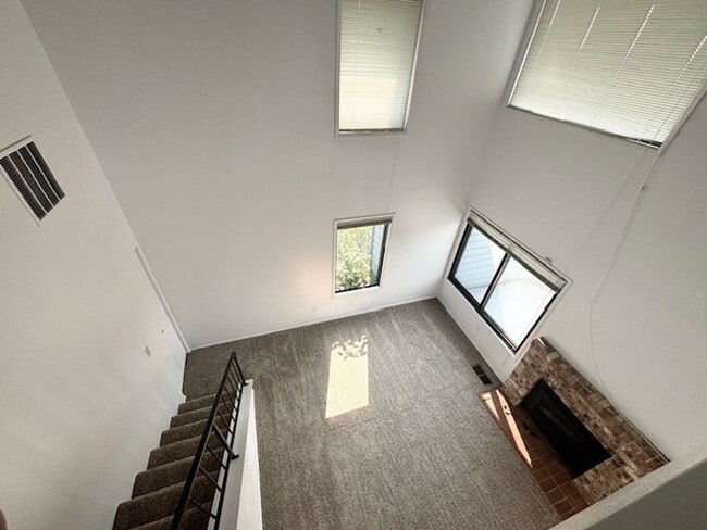 Building Photo - DES MOINES CONDO WITH PEEK-A-BOO SOUND VIEWS & PRIVATE GARAGE!