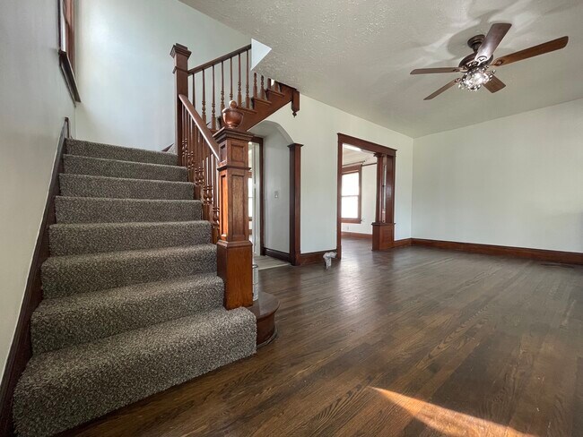 Staircase and Living room - 10212 Plymouth Ave
