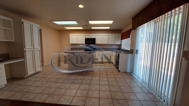 Building Photo - This is a large 4 bedroom, 3 bath SOLAR house with a bonus room upstairs