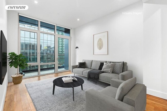 Building Photo - 21-59 44th Drive 2C