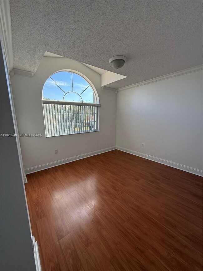 Building Photo - 5588 NW 102nd Ct