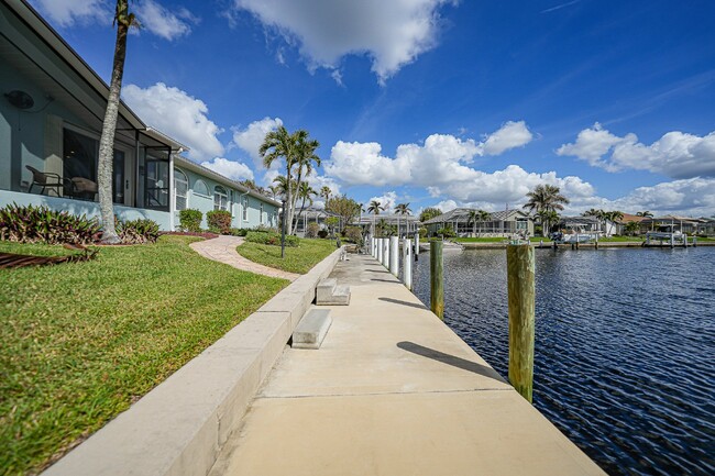 Building Photo - "Waterfront home with Courtyard Pool"