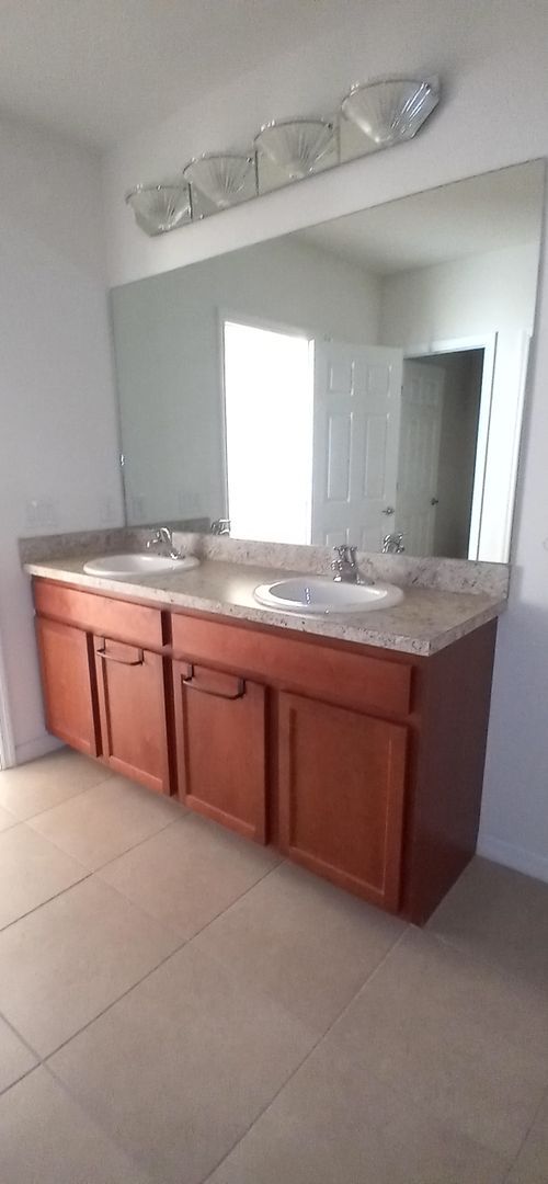 Building Photo - Coming Soon: Charming and Cozy 3 bedroom / 2 bathroom Home with 2 Car Garage, Lake View in Gated ...