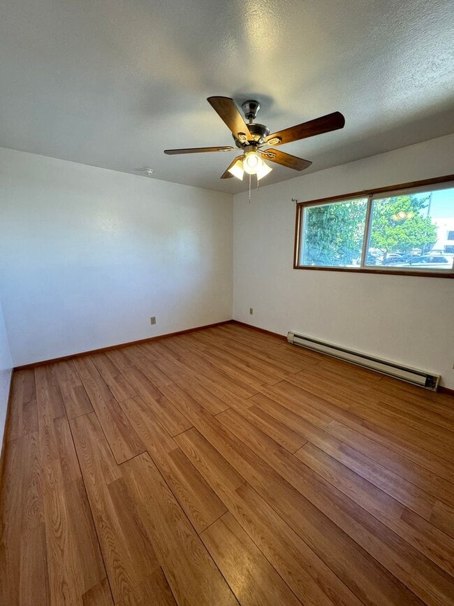 Building Photo - 2bdrm, 1 bath duplex with carport and fenced yard