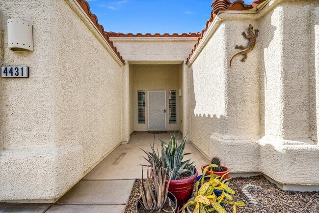 Building Photo - Multiple Living Areas 4-Bedroom Retreat with Vaulted Ceilings & No Carpet