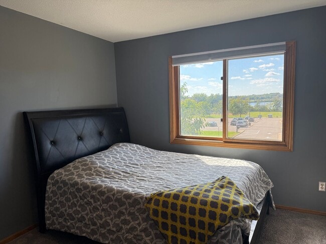 Building Photo - Two Bedroom Townhouse W/ Views Of Rice Lak...