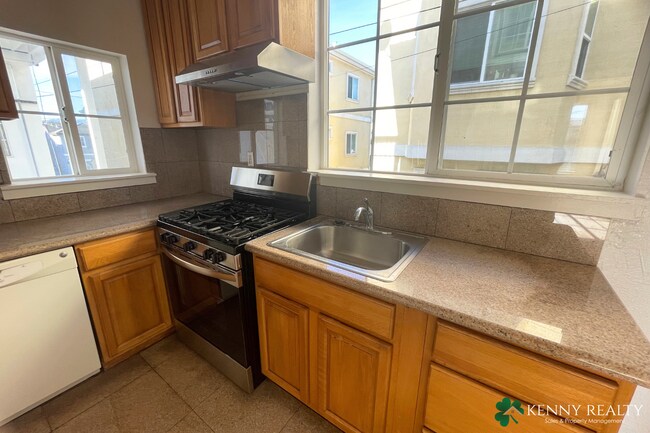 Building Photo - Spacious & Sunlit 5-Bedroom Retreat in the...