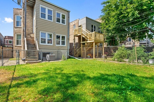 Building Photo - 6239 S Langley Ave