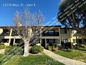 Building Photo - Charming 2-Bedroom Condo in Gated Lincoln ...