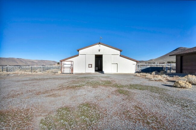 Building Photo - 20 Acre Ranch with House, Barn, Separate Workshop, and 5-Car Garage