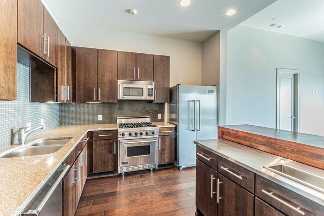 Building Photo - Exclusive wastside condo now available!