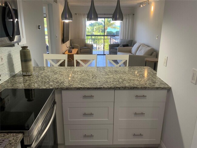 Building Photo - 6444 Collins Ave