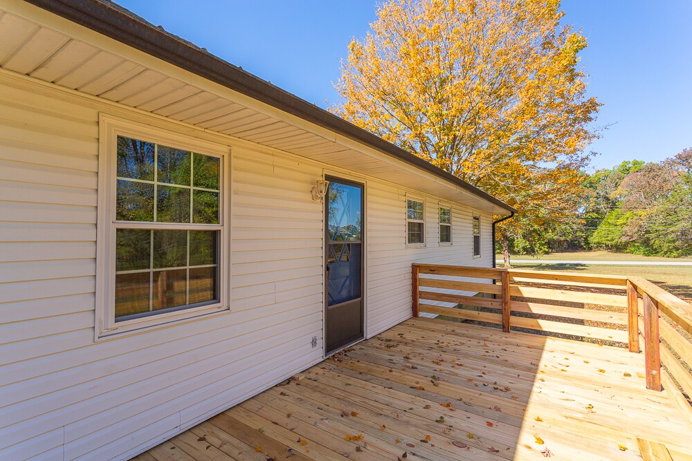 back deck leading into kitchen/dining room - 9225 Amos Rd