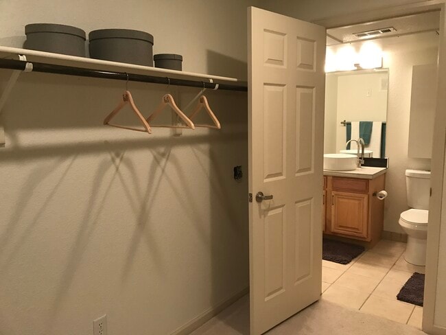 Primary closet to Primary bath - 5201 South Fox Street
