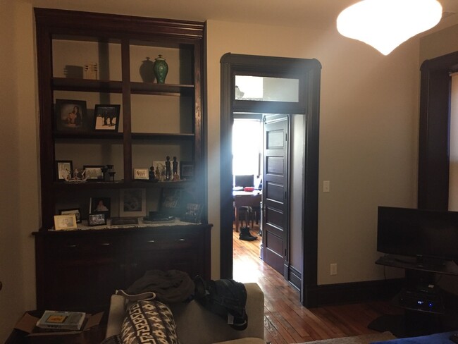 Living room with restored butler pantry - 4248 Manchester Ave