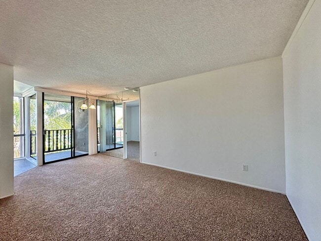 Building Photo - Upgraded 2 Bedroom Condo in San Carlos!!  Water/Sewer/Trash Included!!