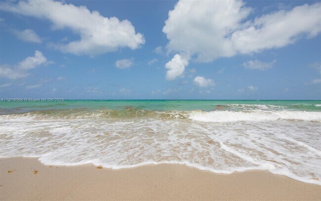 Building Photo - 10275 Collins Ave