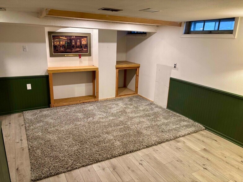 Basement living room - 3276 S Lenox St