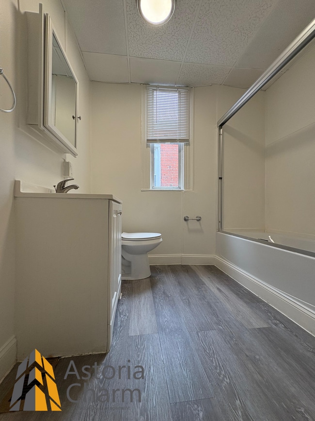 Building Photo - Updated 4 BR Home with Spacious Yard & Pre...