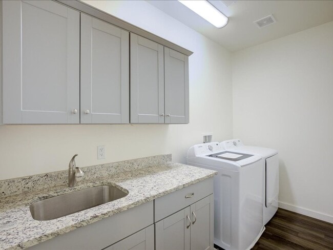 Building Photo - Stylish Two-Story Living with Modern Comforts!